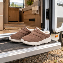 rest slippers beige in a motorhome doorway